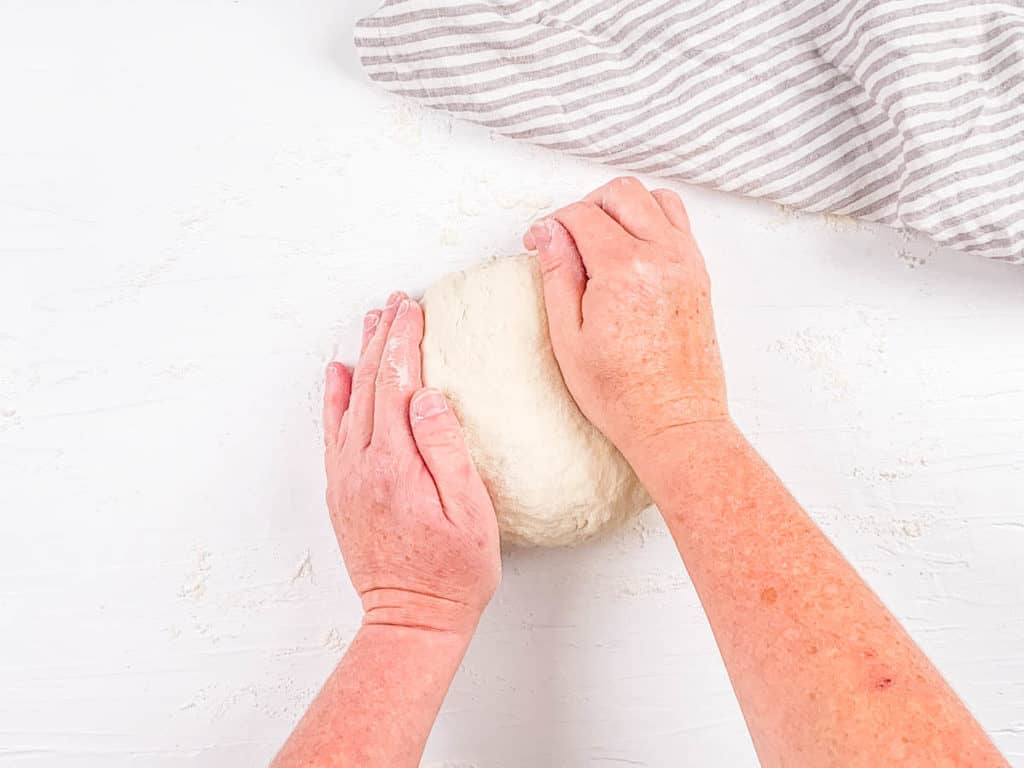 paratha dough on a cutting board