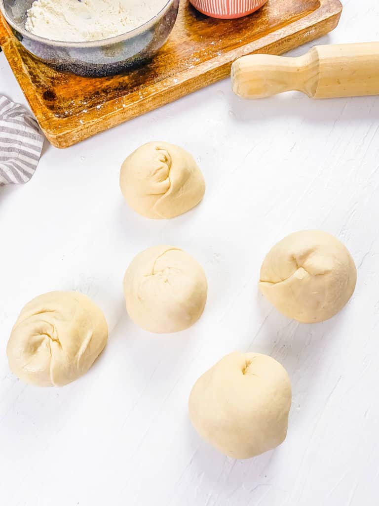 paratha dough on a cutting board