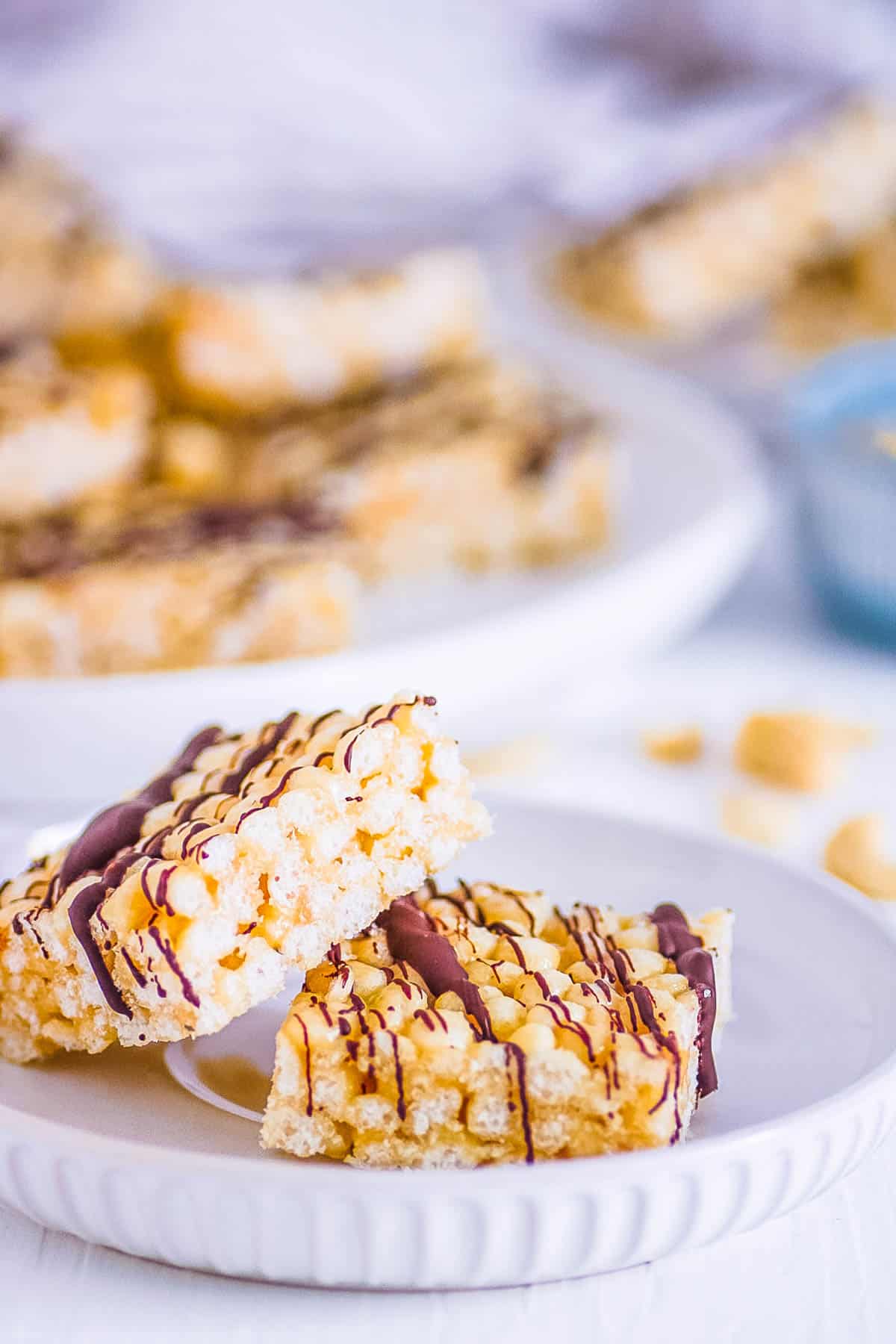 Healthy rice krispie treats on a white plate.