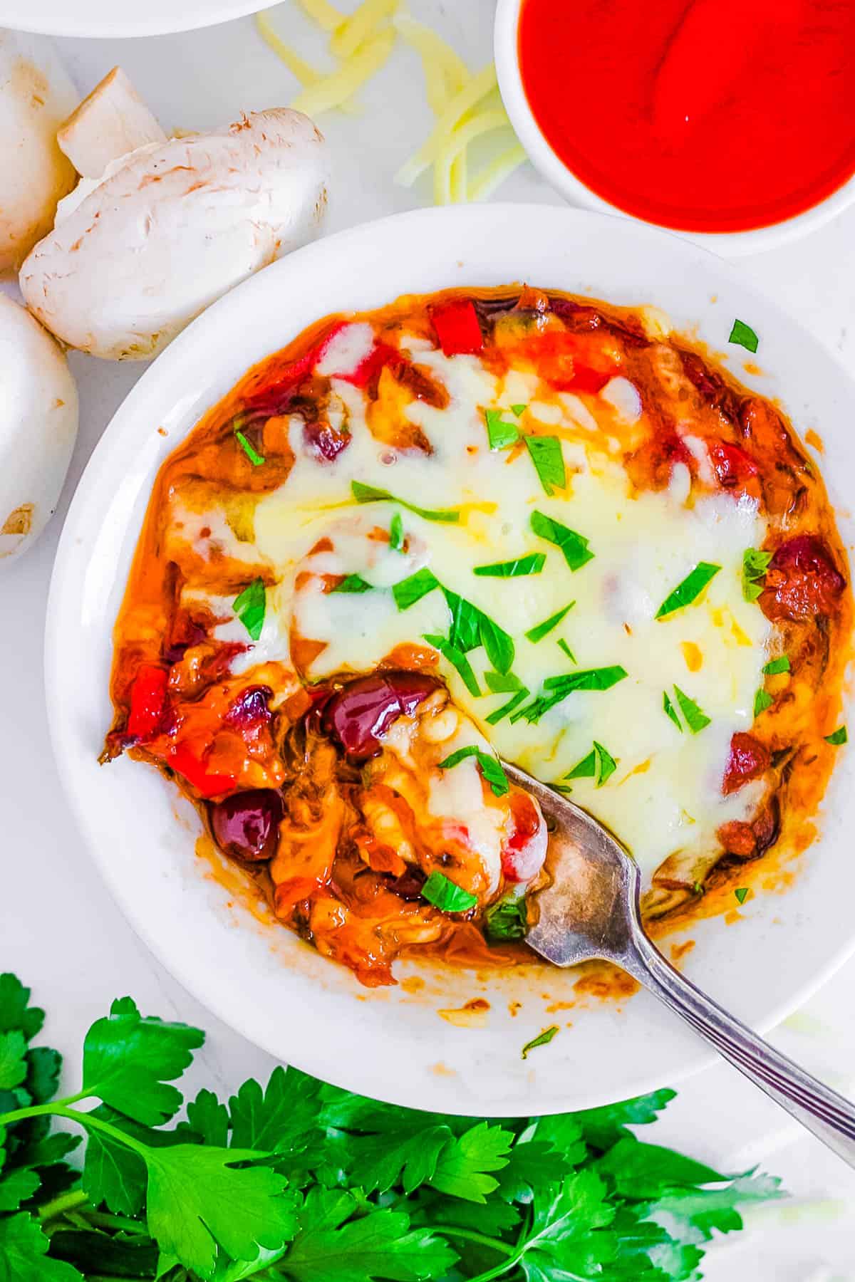 easy no crust keto pizza bowl with cheese and veggies