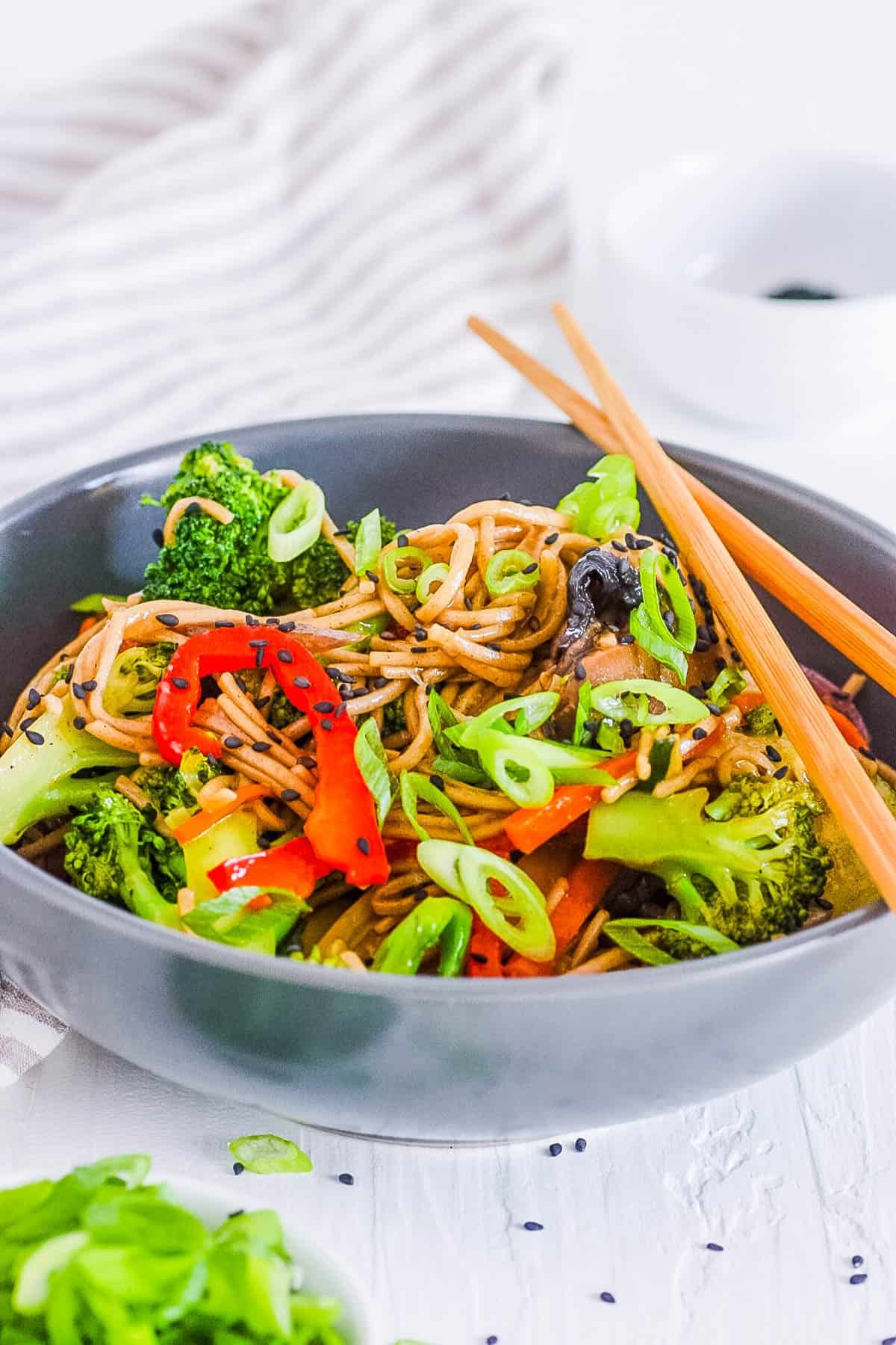 healthy easy vegan teriyaki noodles with veggies in a bowl