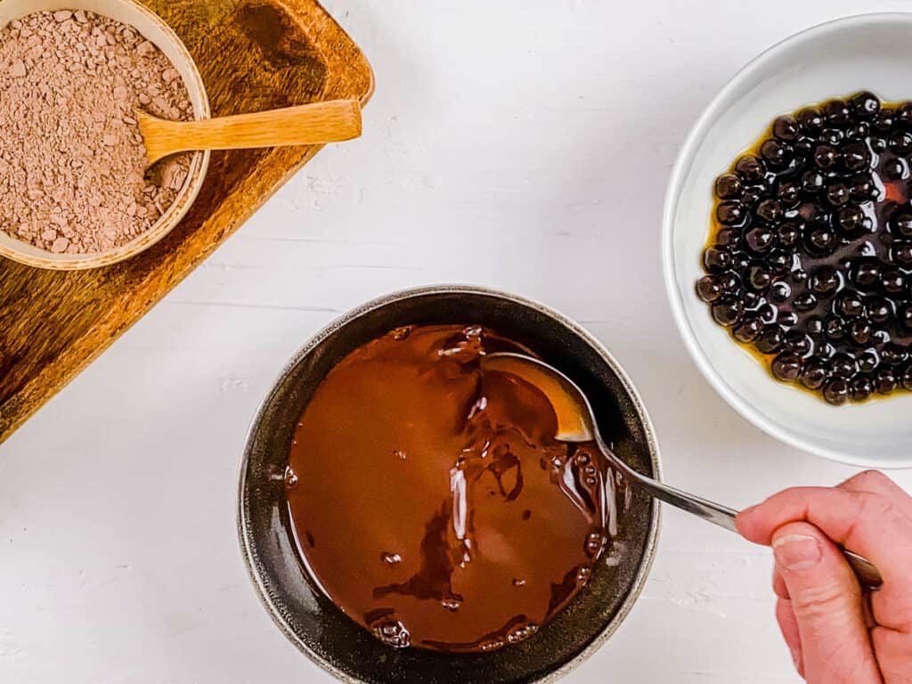 Chocolate sauce in a sauce pan.