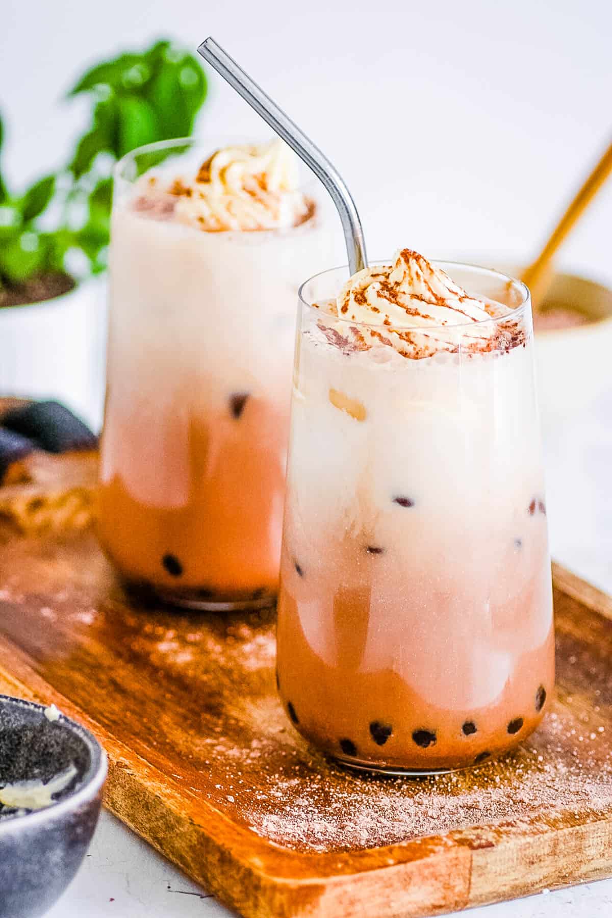 Homemade chocolate milk tea with boba in a glass.