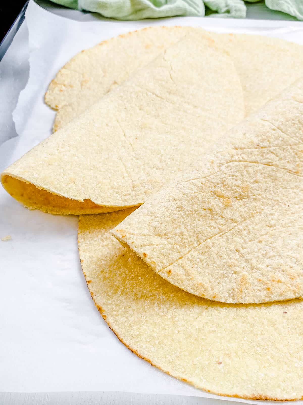 Gluten free, healthy almond flour tortillas on parchment paper