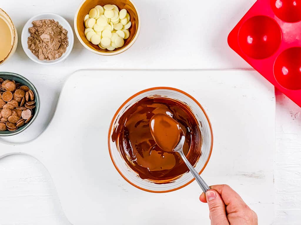 Chocolate ganache mixed in a bowl.