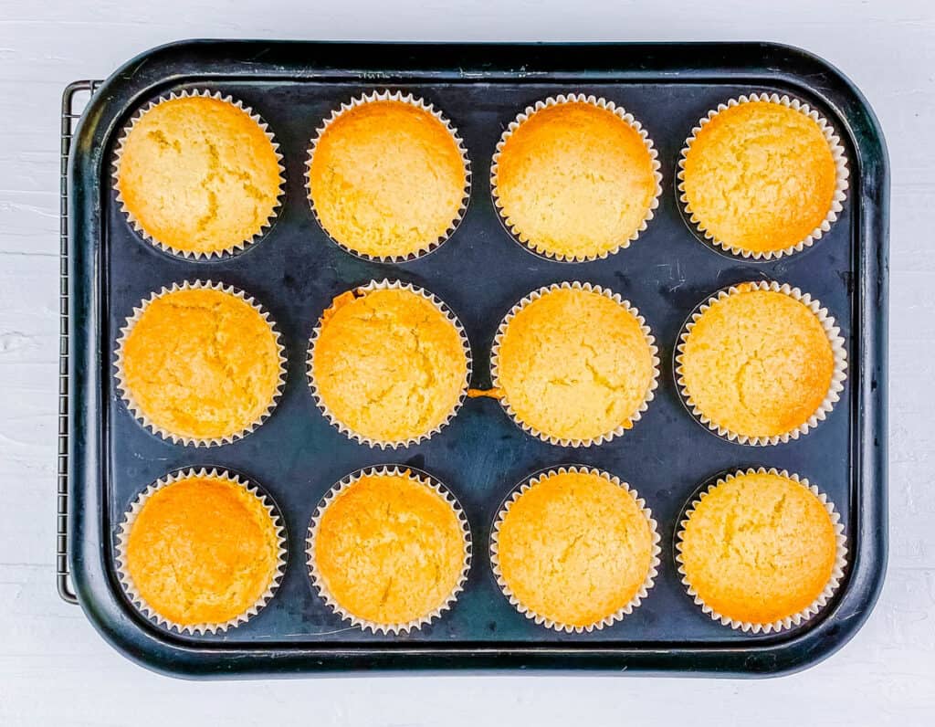 Vegan lemon cupcakes on a baking sheet.