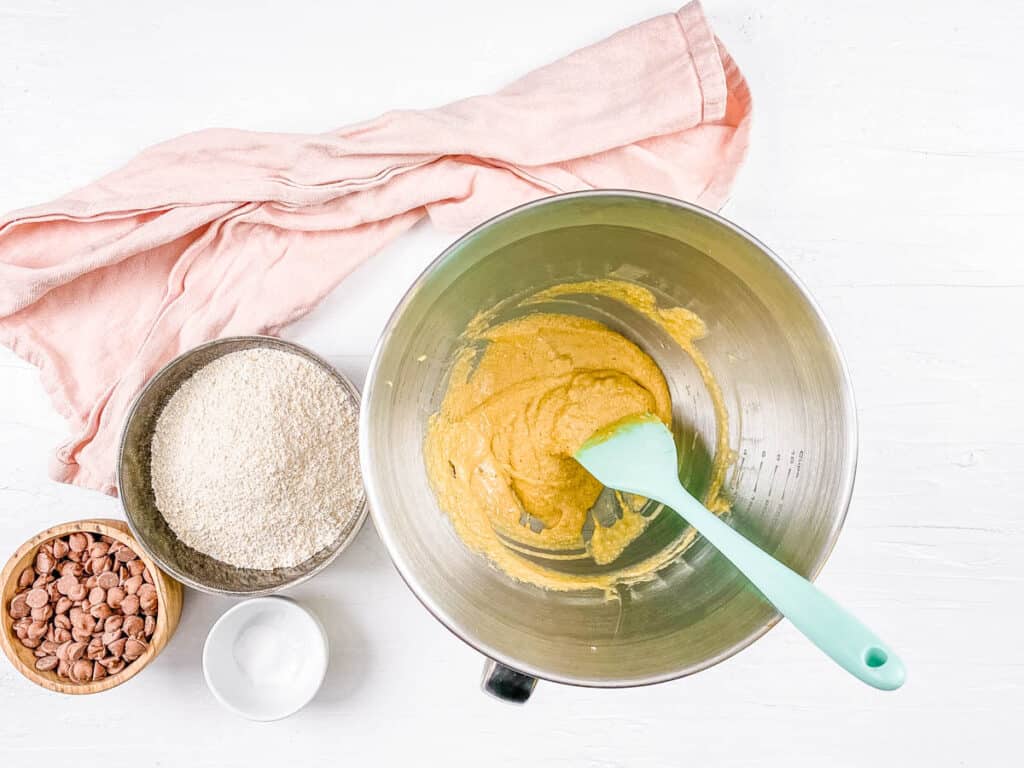 Cookie batter in a mixing bowl.