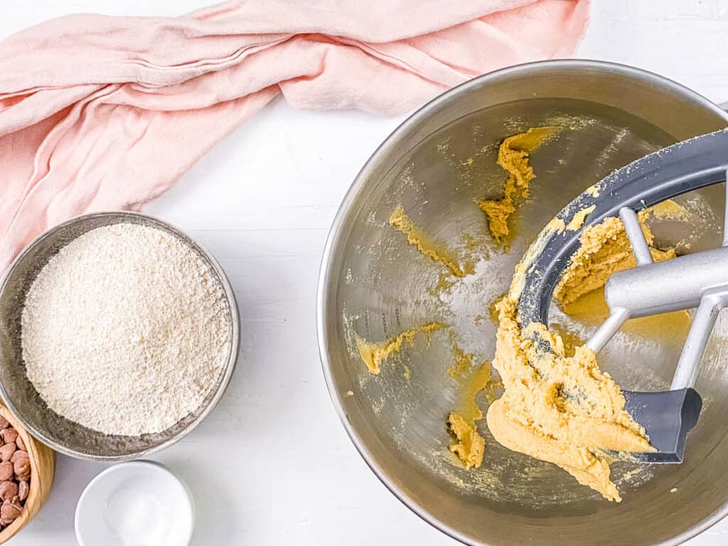 Cookie batter in a stand mixer.