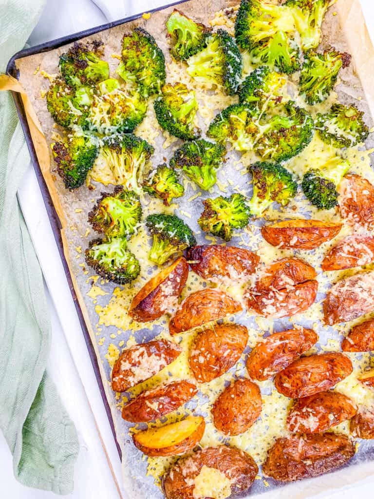 Broccoli and potato bake on a baking sheet.