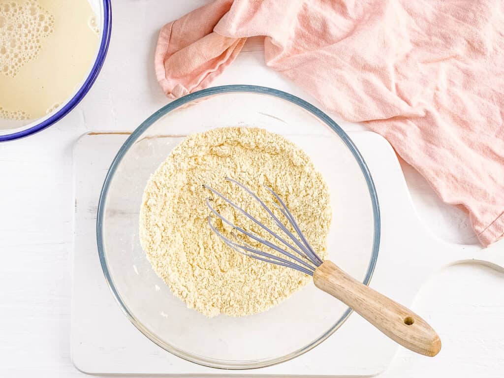 Dry ingredients for pancakes combined in a bowl.