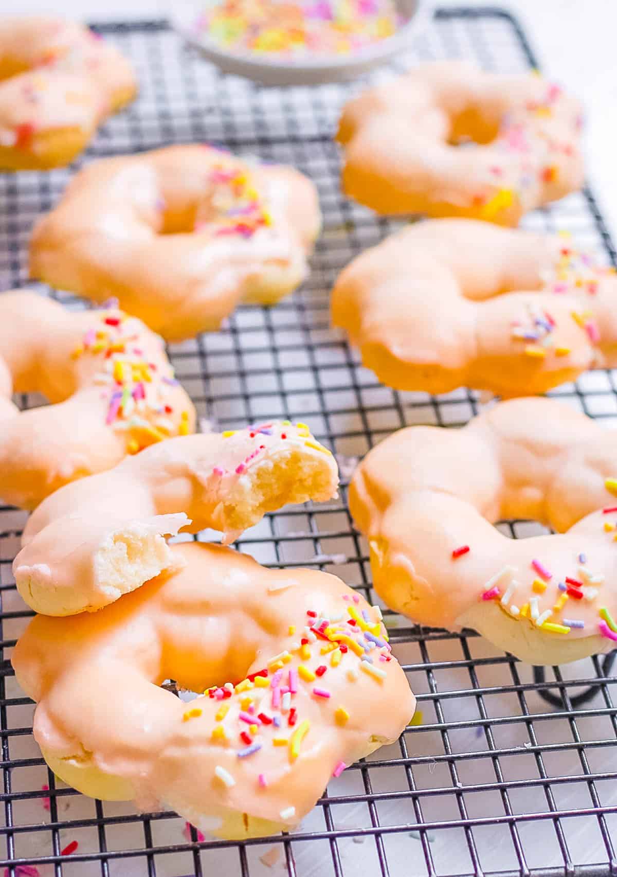 Easy gluten free vegan mochi donuts on a wire rack.