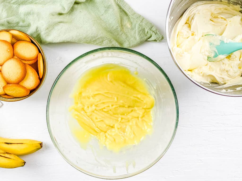 Instant vanilla pudding mix in a mixing bowl.