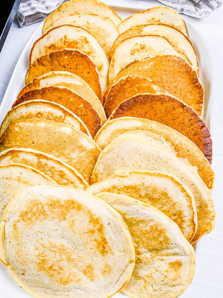 Easy sourdough discard pancakes stacked on a plate