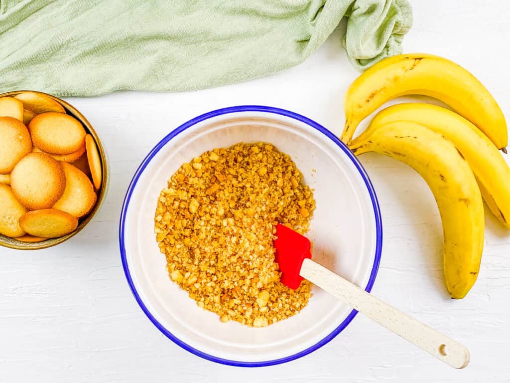 Crushed Nilla wafers in a mixing bowl.