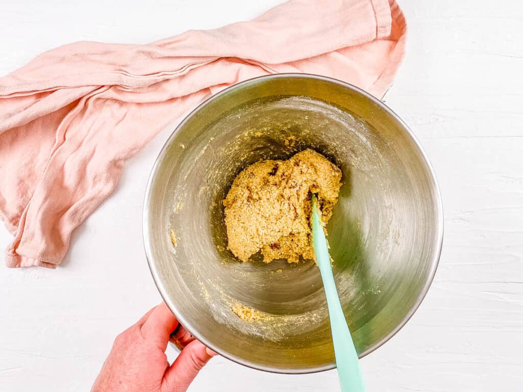 Cookie batter in a mixing bowl.