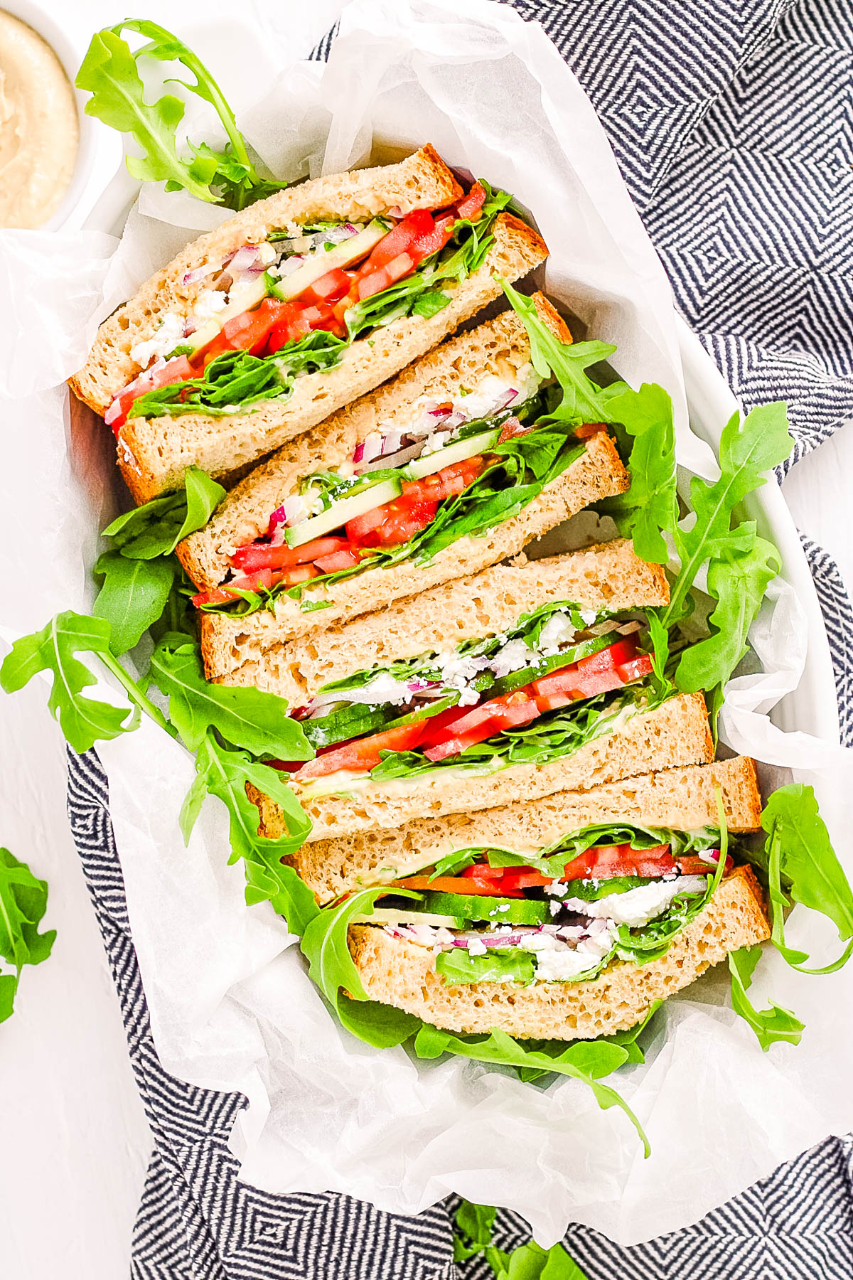 Copycat Panera mediterranean veggie sandwich recipe in a bread basket.