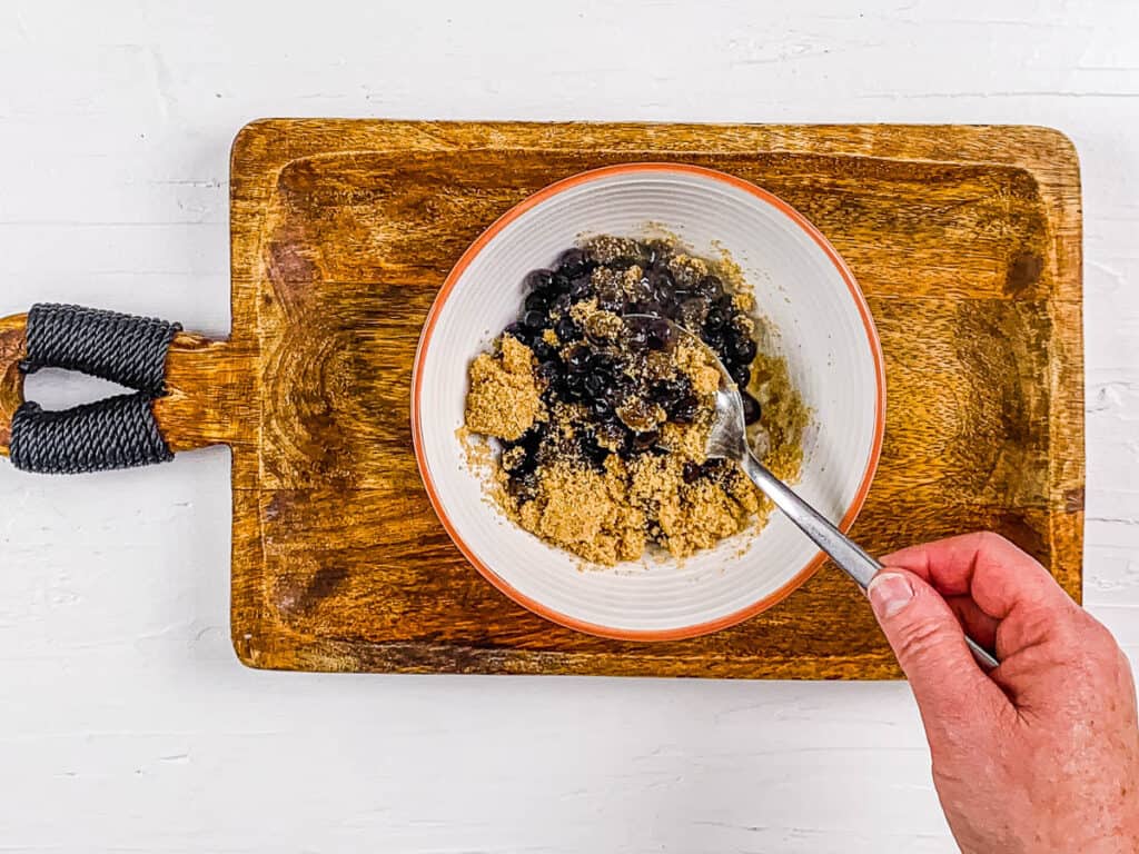 Boba pearls mixed with brown sugar in a bowl.