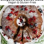 a gingerbread bundt cake with pomegranate seeds on top