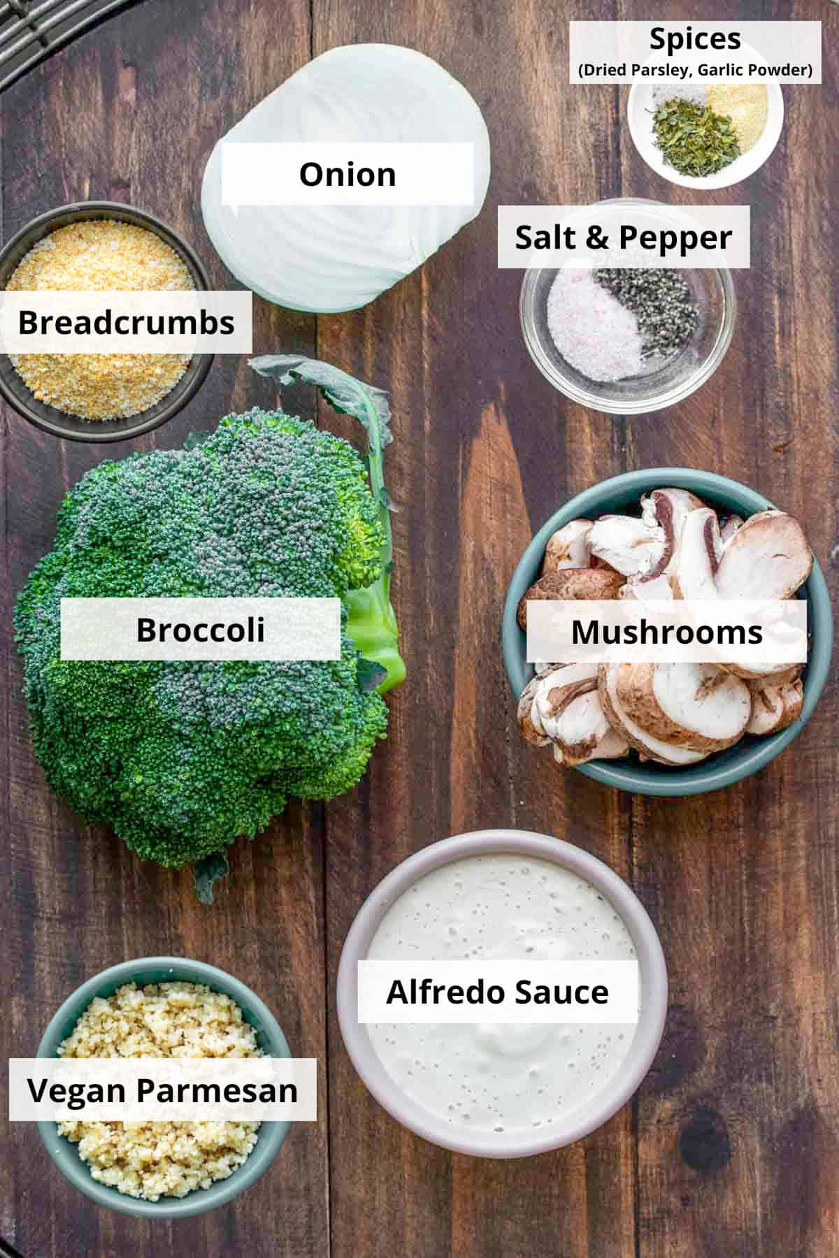 Bowls with ingredients needed to make a vegan broccoli casserole on a wooden surface.