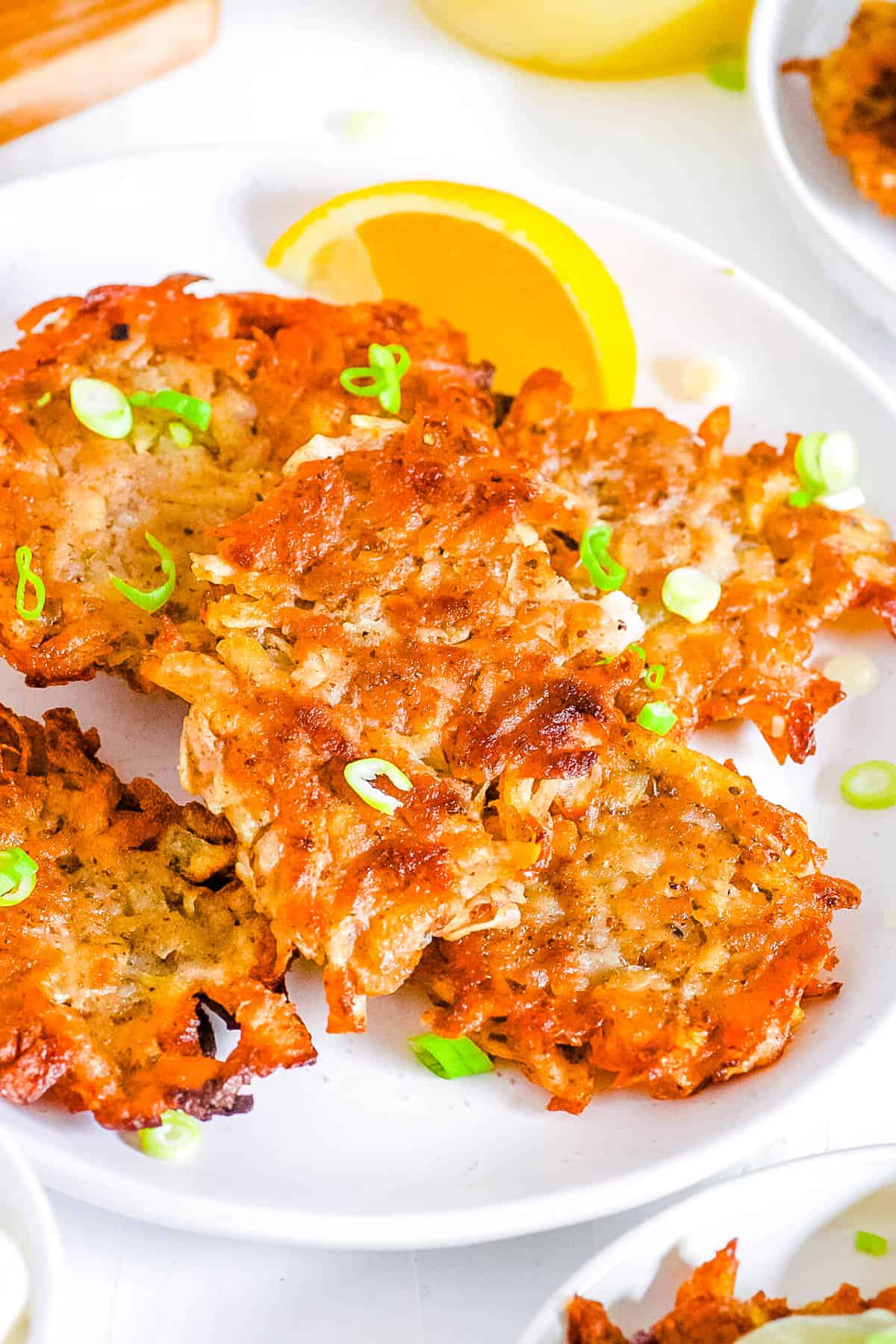 Vegan potato pancakes on a white plate.