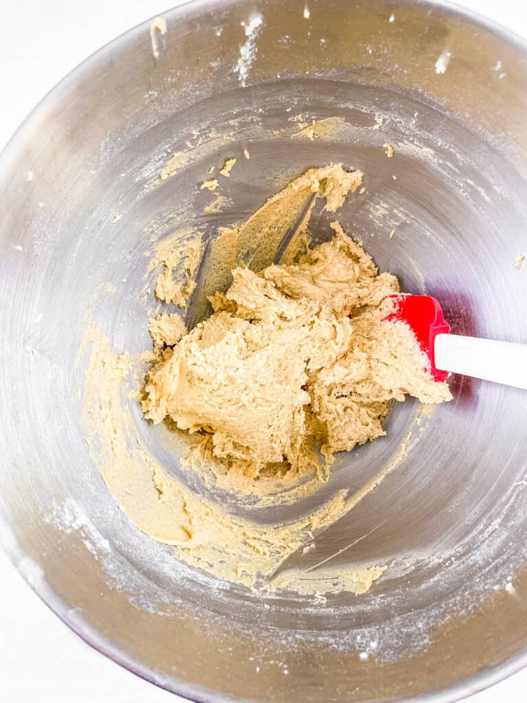 Cookie dough mixed in a mixing bowl.