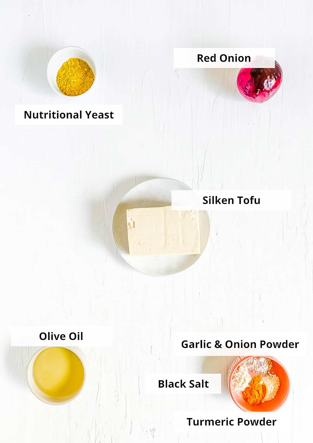Ingredients for easy silken tofu scramble recipe on a white background.