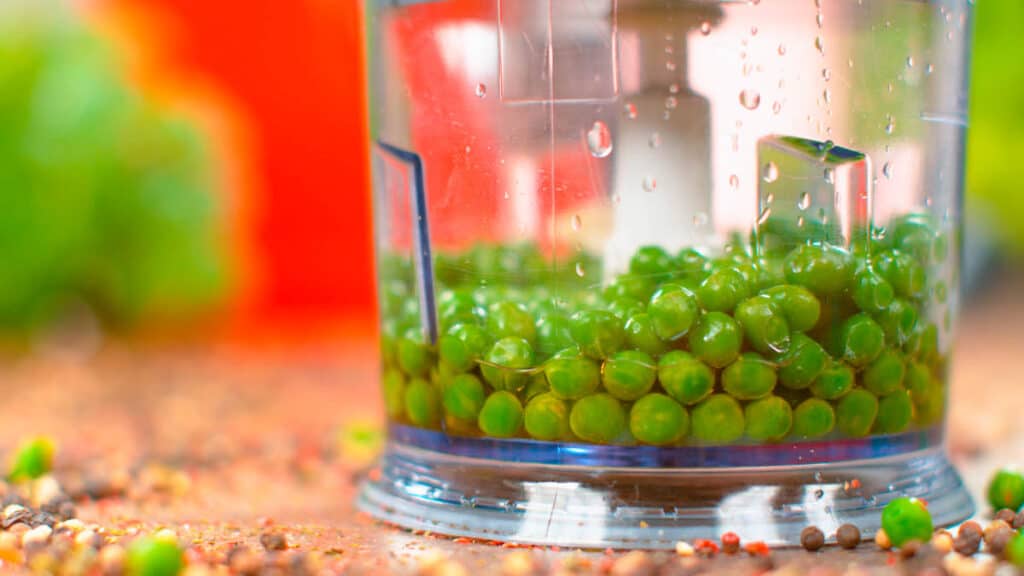 Peas and water in a food processor.