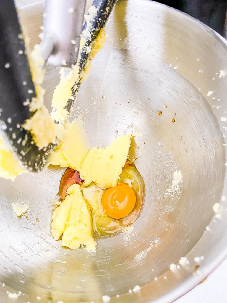 Eggs and butter creamed in a stand mixer.