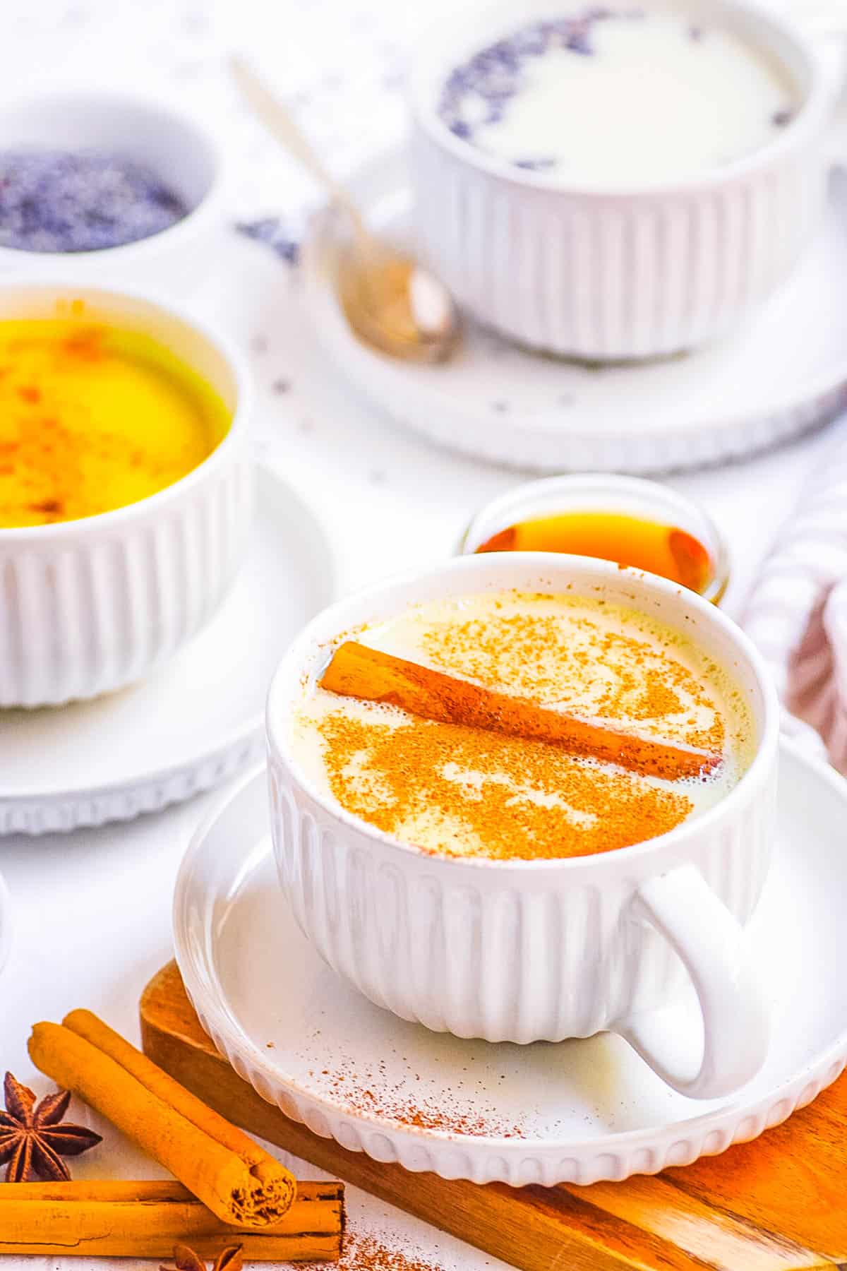 Easy moon milk recipe served 3 ways - turmeric, lavender and chai flavored.
