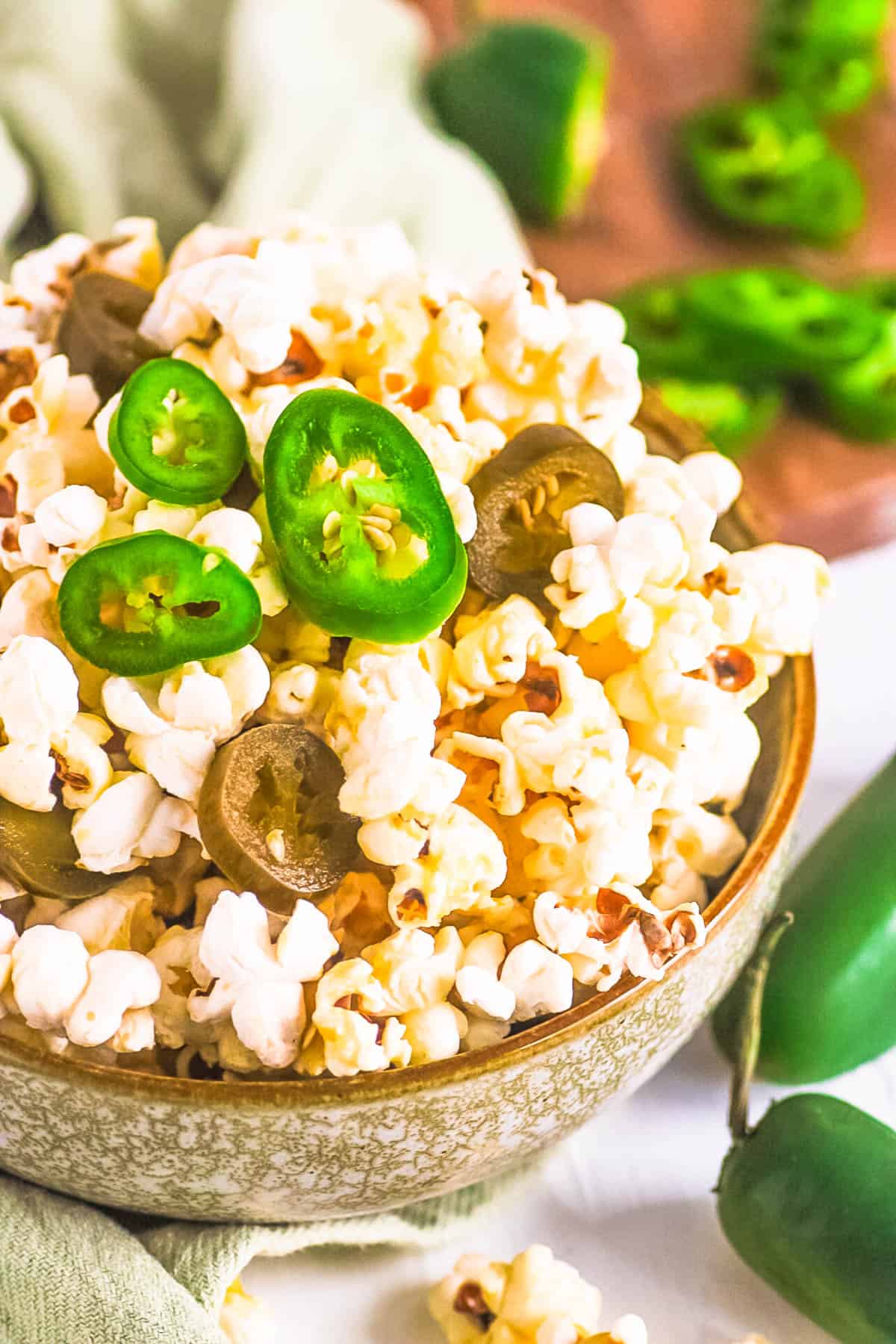 Jalapeno popcorn in a green bowl.