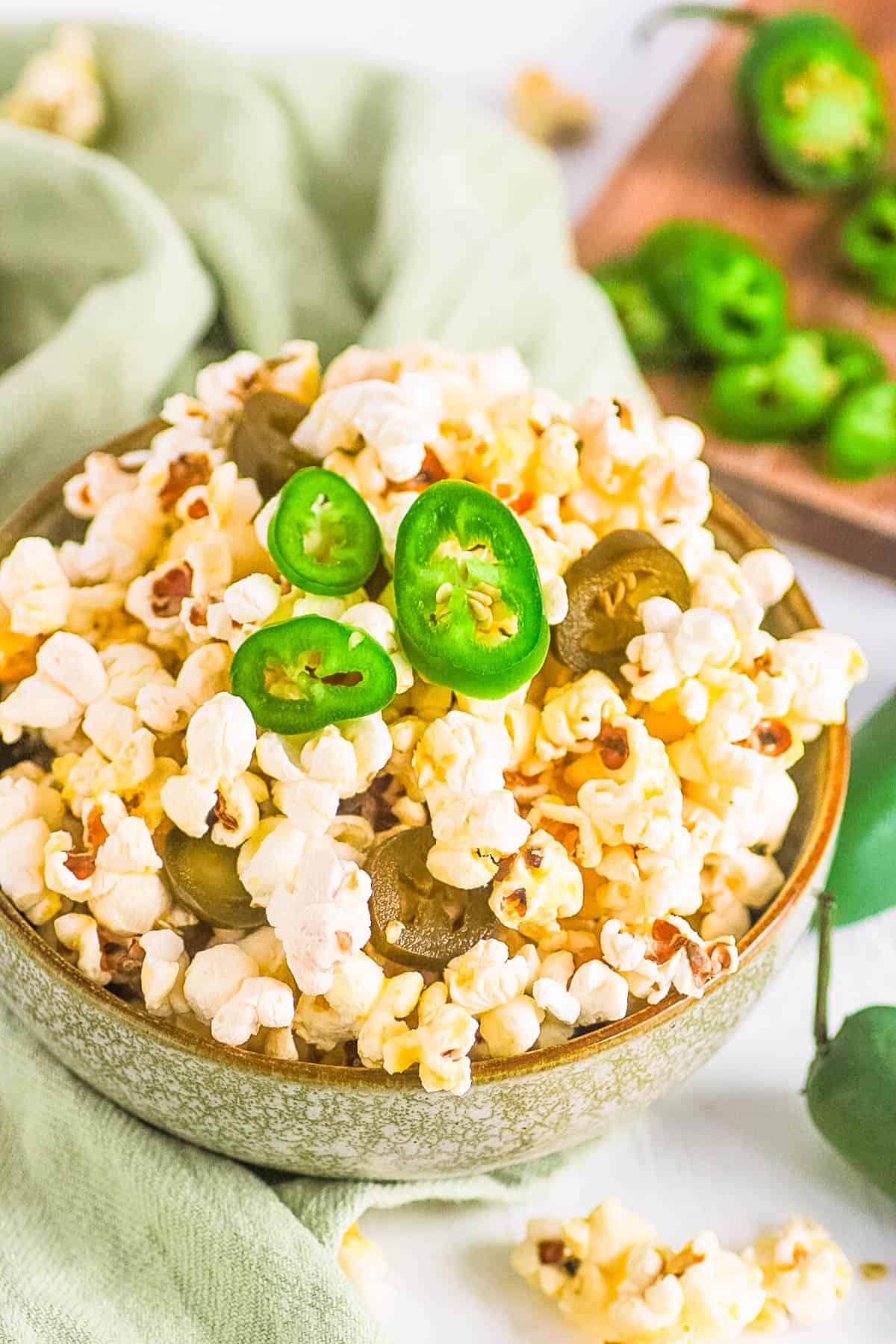 Jalapeno popcorn in a green bowl.