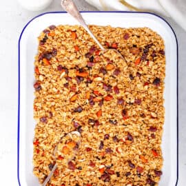 Healthy homemade low calorie granola on a baking sheet.