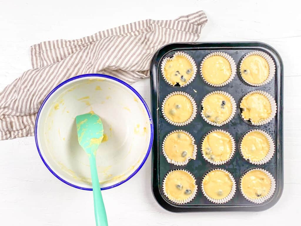 Milk free muffin batter transferred to a muffin tin.