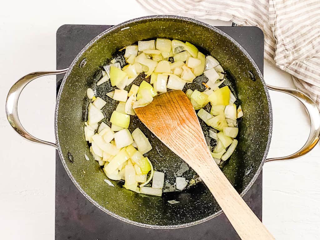Onions sauteeing in a pot