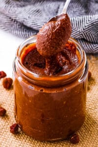 Easy homemade vegan nutella in a glass mason jar.