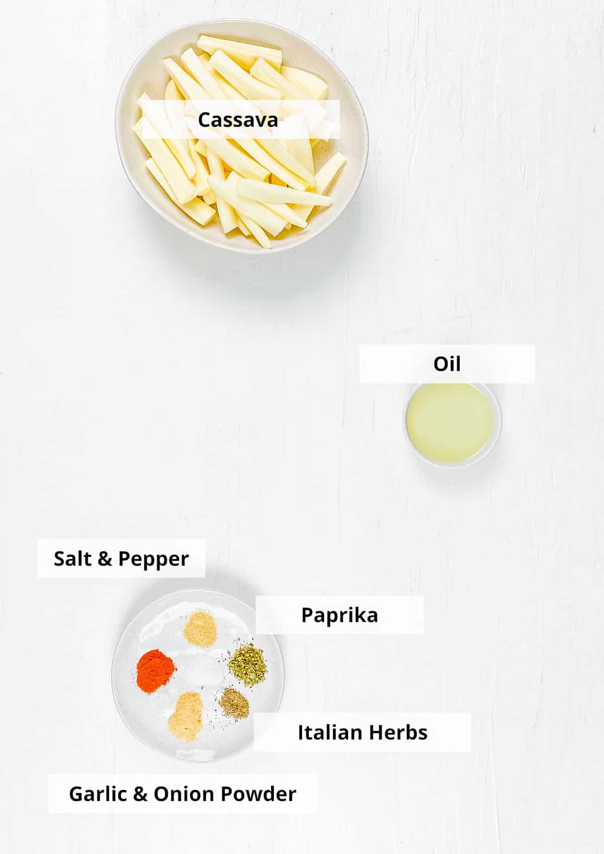 Ingredients for air fryer yuca fries recipe on a white background.