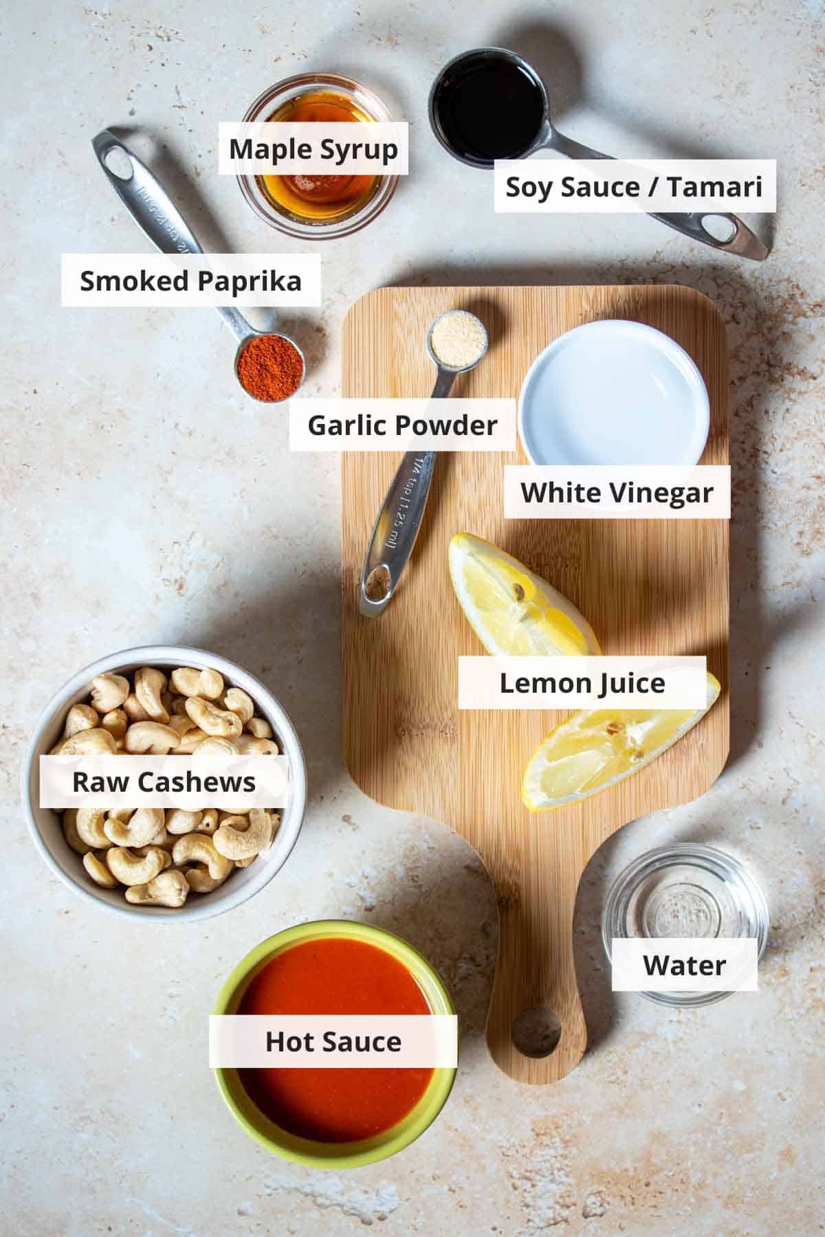Ingredients for healthy vegan buffalo sauce recipe on a countertop.