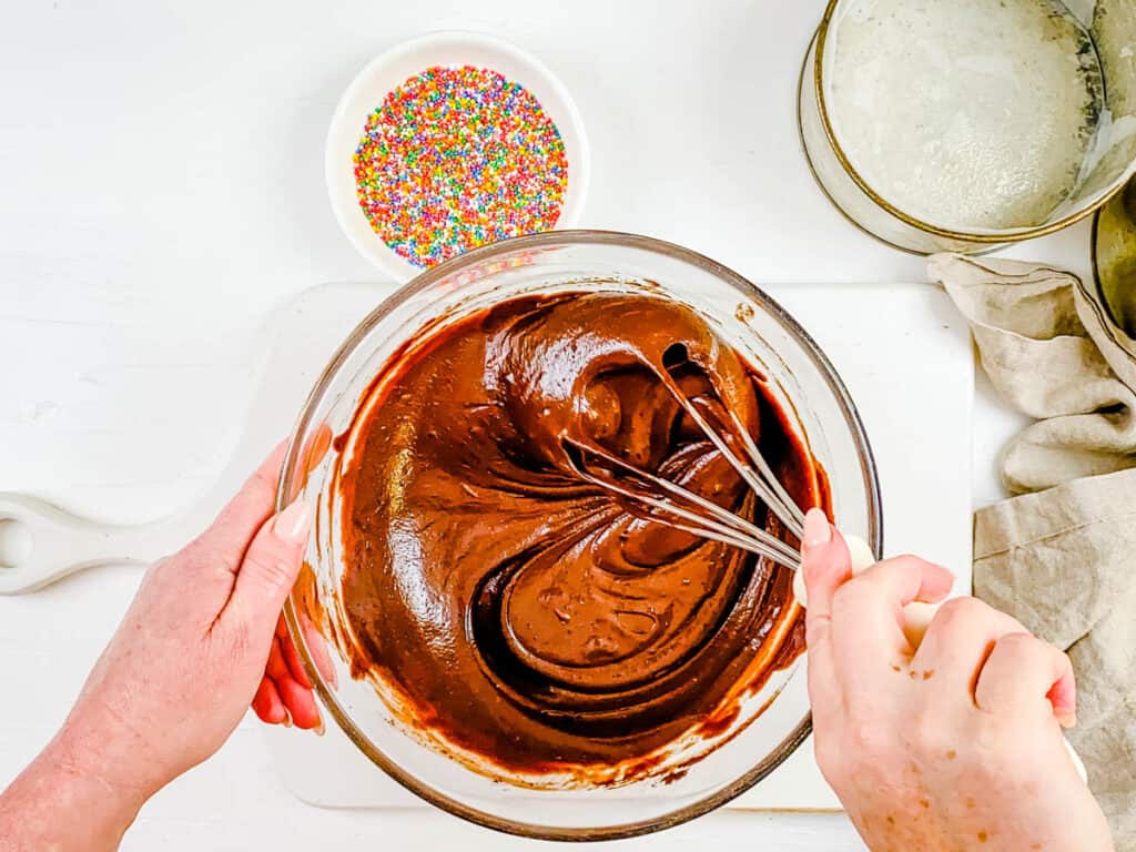 Chocolate cake batter in a mixing bowl.