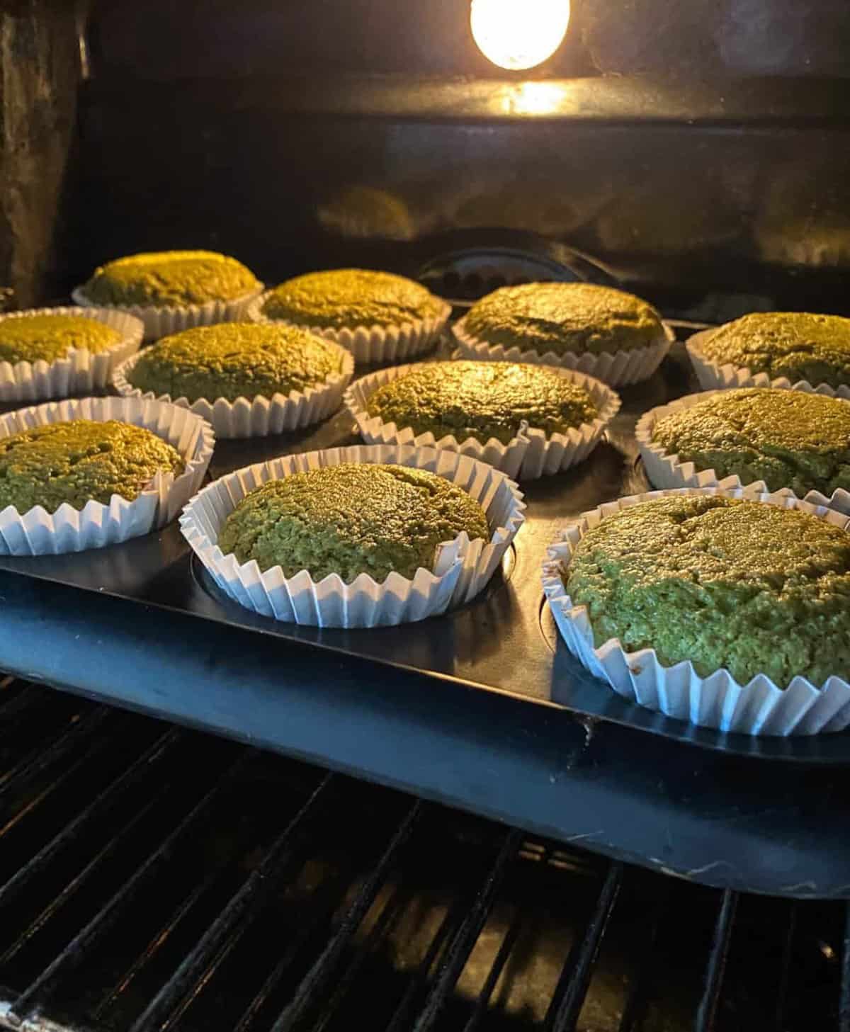 muffins in tray bakng in oven