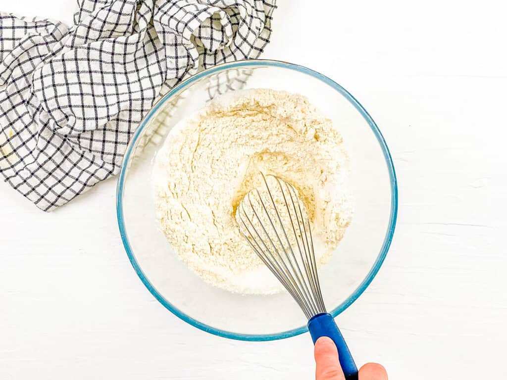 Dry ingredients for muffins mixed in a bowl.