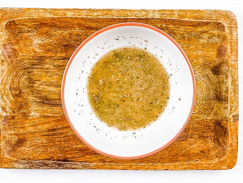 Salad dressing mixed in a bowl.