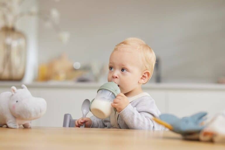 Baby drinking goat milk formula - benefits of goat milk formula