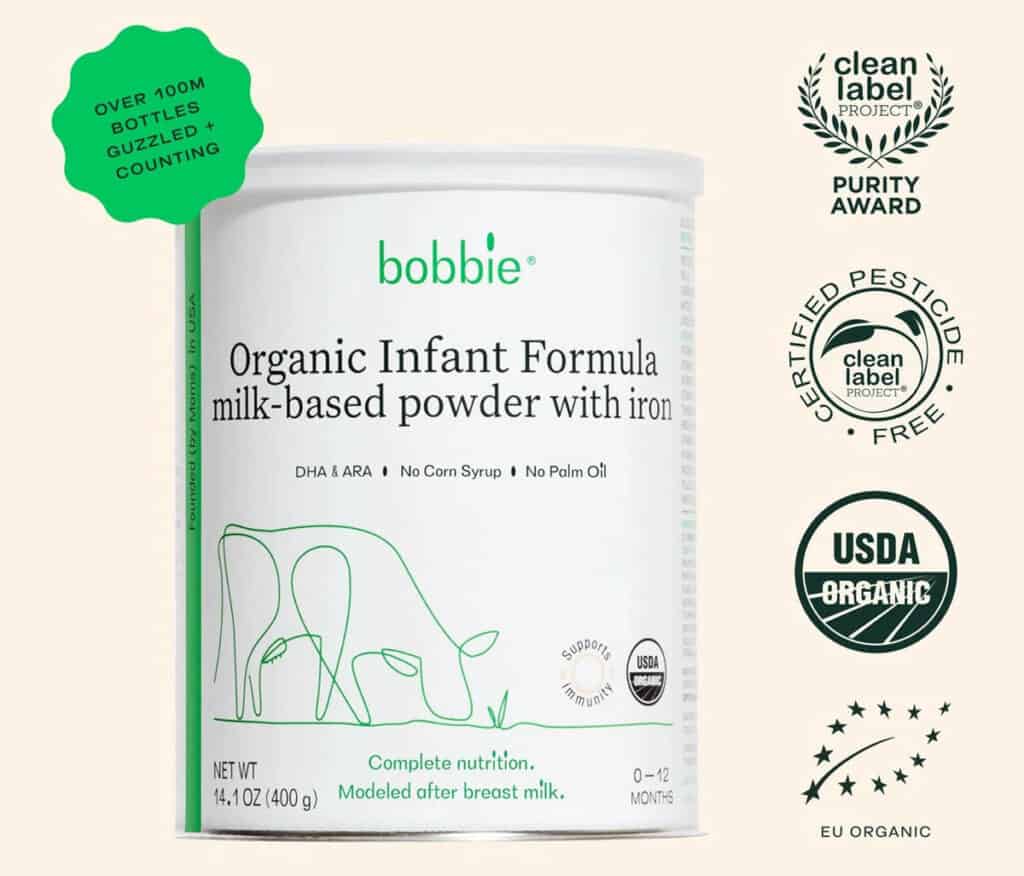 Bobbie formula review - photo of Bobbie organic infant formula canister on a beige background.