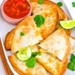 Healthy air fryer quesadilla recipe served on a white platter with salsa on the side.
