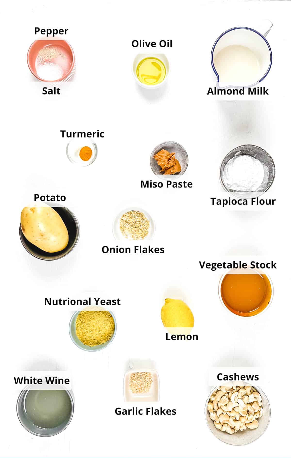 Ingredients for homemade vegan fondue recipe on a white background.