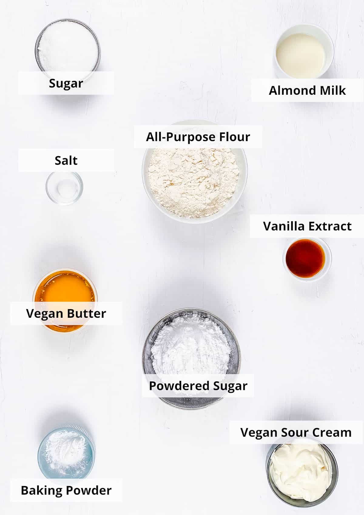 Ingredients for vegan pound cake recipe on a white background.