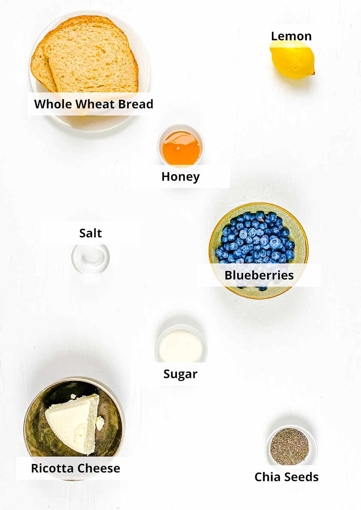 Ingredients for cream cheese toast recipe with blueberries and 15 other variations.
