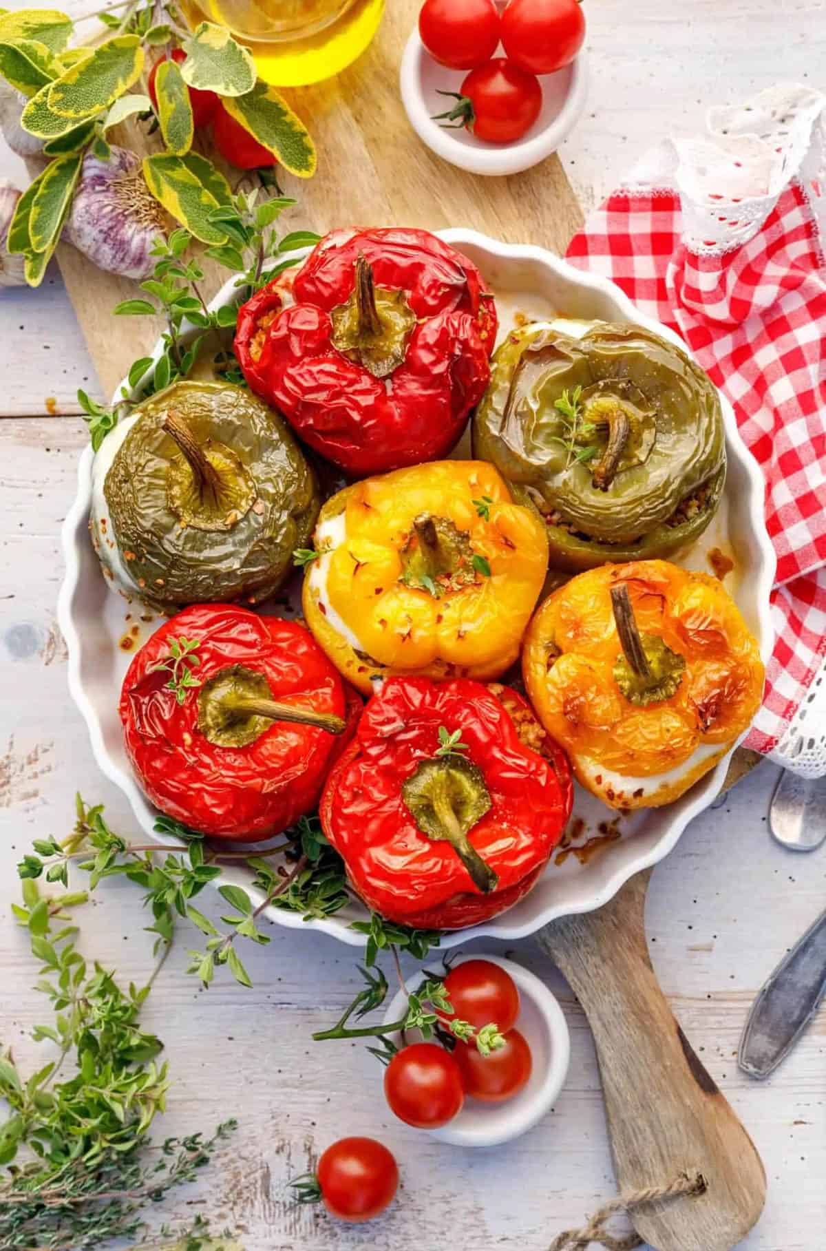 Vegetarian Mexican recipes - taco stuffed peppers on a white platter.