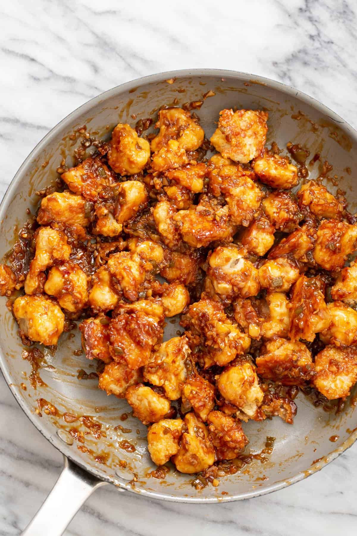 vegan cauliflower manchurian in a saucepan 