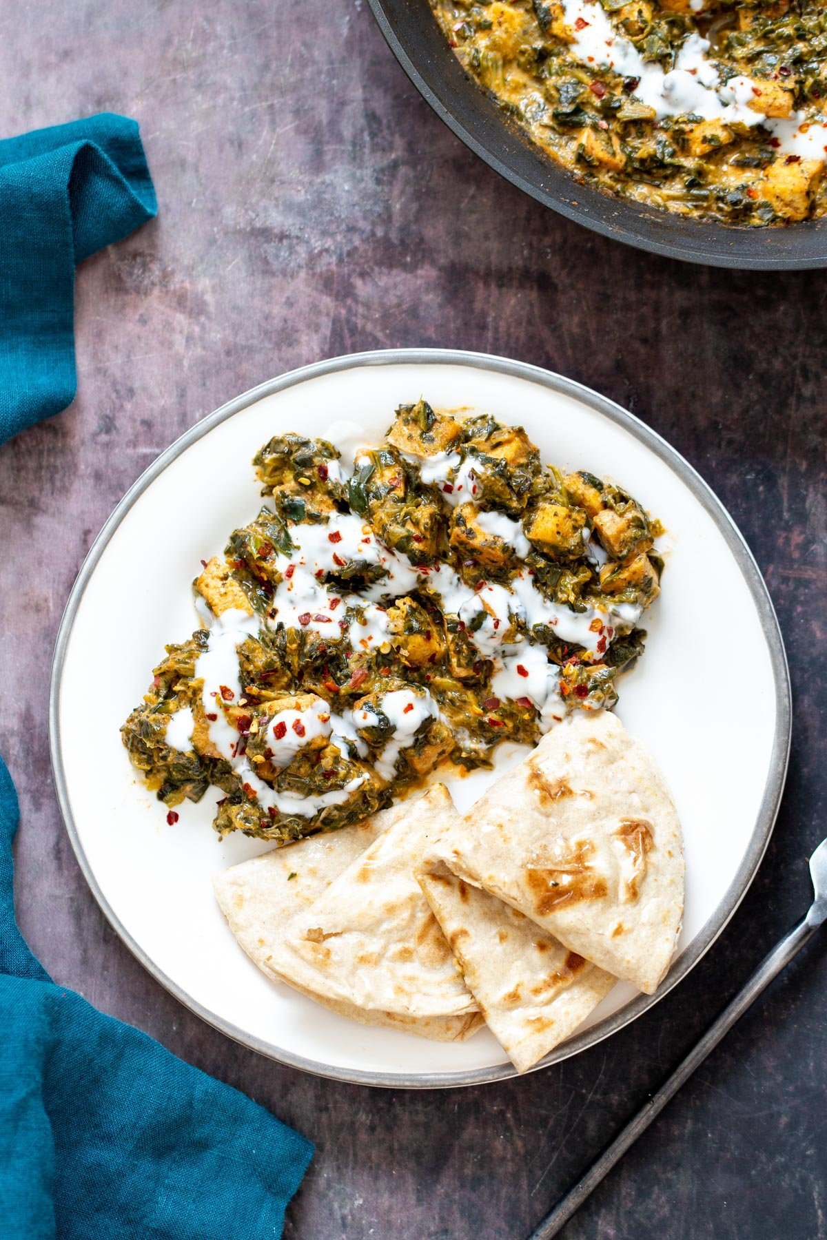 spicy spinach tofu Stir fry served with a side of flatbread 